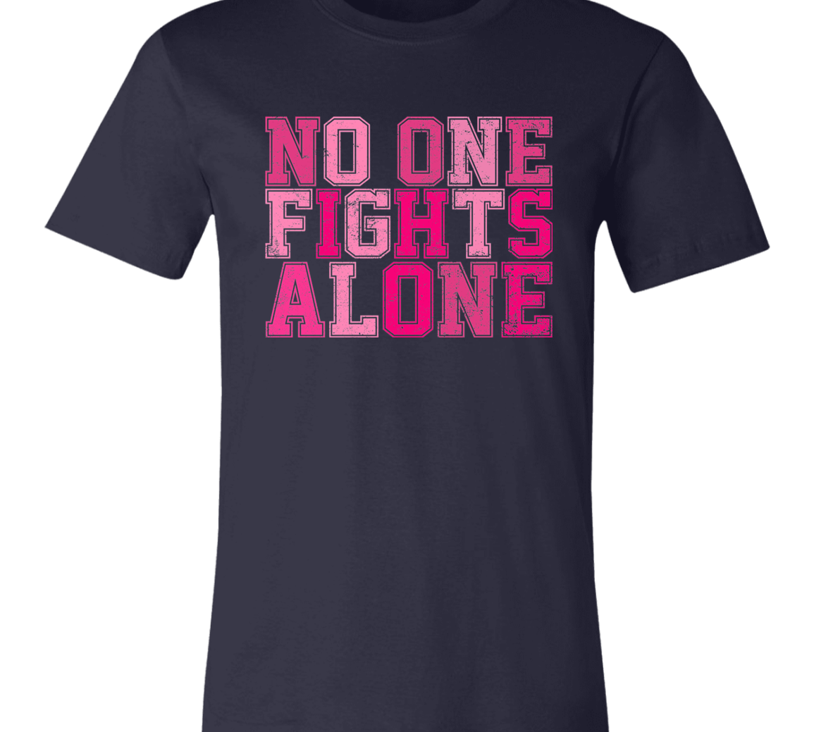 navy short sleeve t-shirt with block letters in pink that say, "No one fights alone".