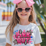A young girl wearing a white graphic t-shirt with a 'PINK OUT' design, pink sunglasses, and a large pink bow in her hair, set against a blurred outdoor background.